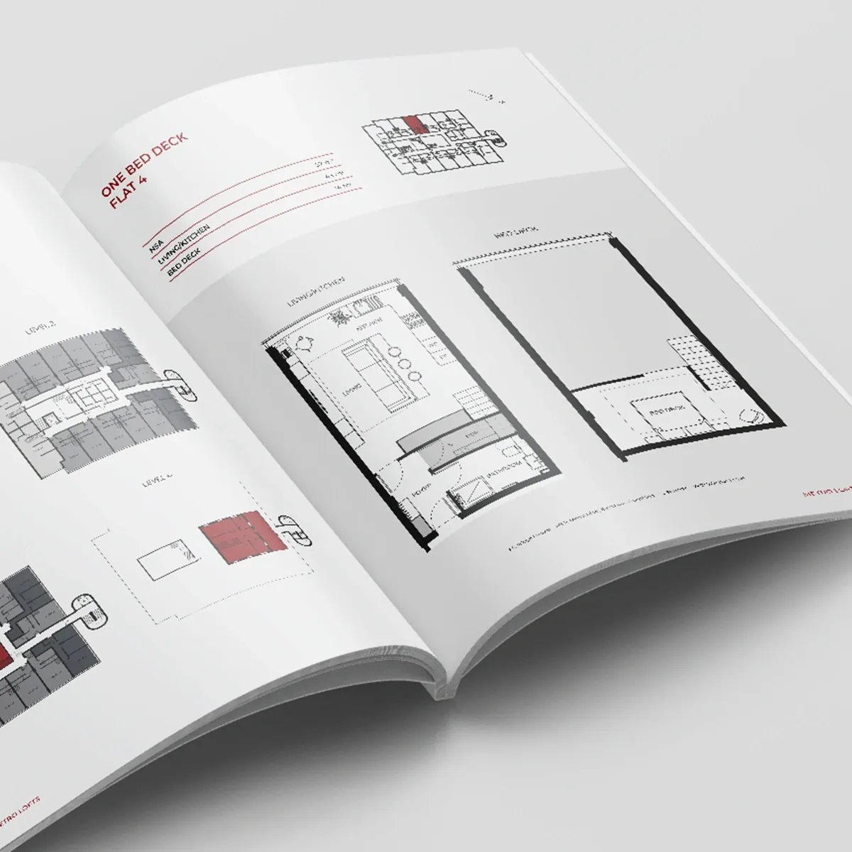 Metro Lofts brochure open at the One Bed Deck apartment floor plan